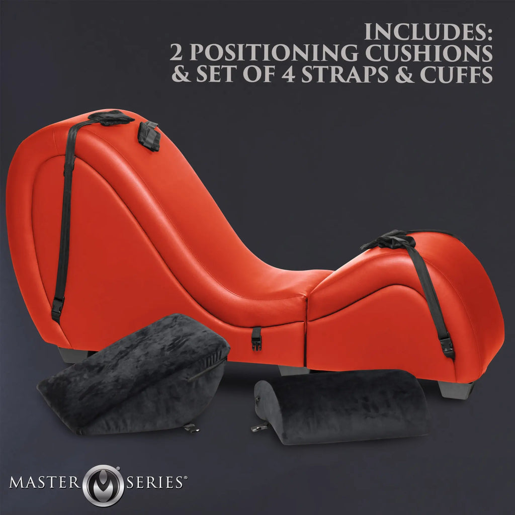 Master Series red, detachable kinky chaise lounge with black straps, cuffs, and two black positioning cushions.