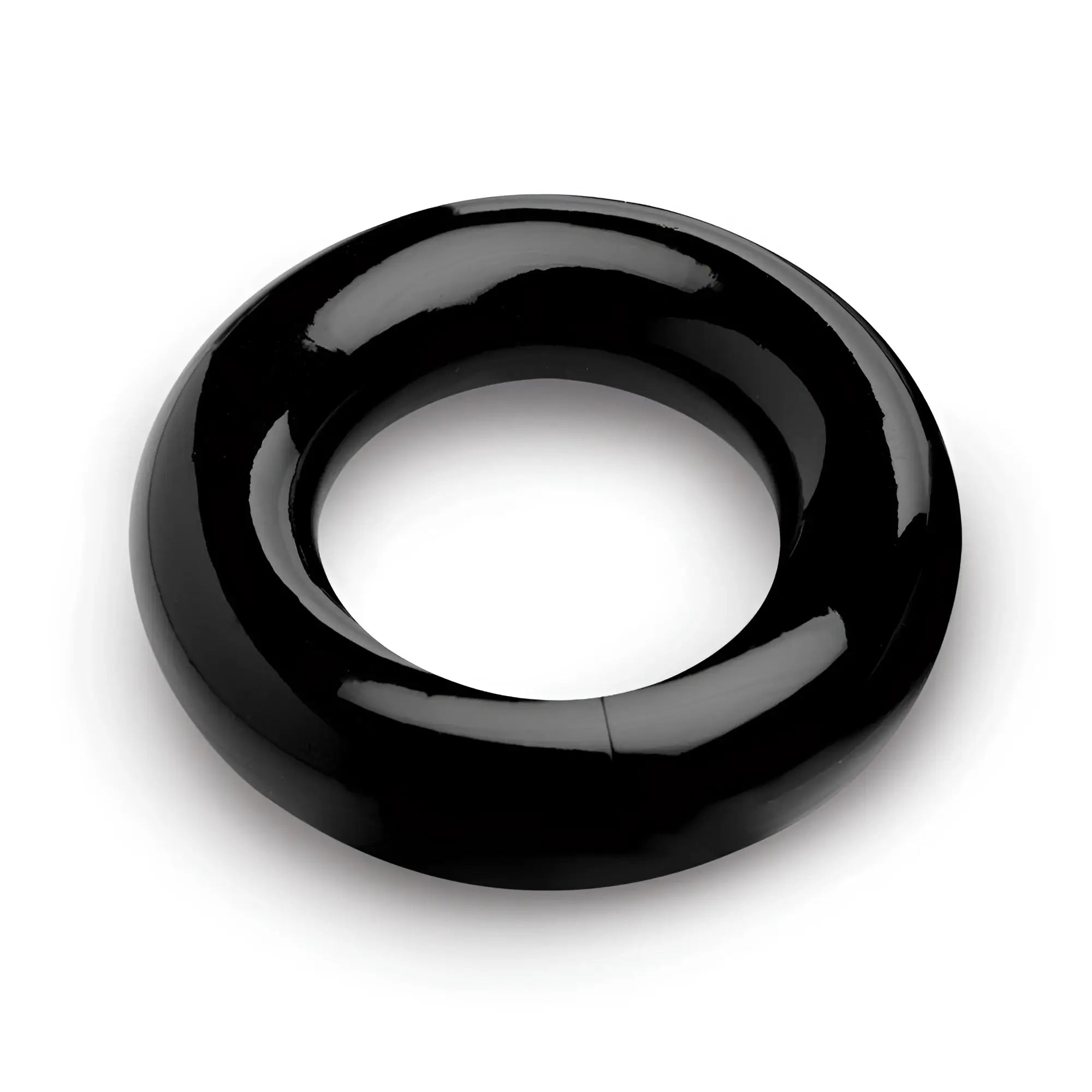 Master Series Ring Master: A thick, glossy black, smooth circular ball stretcher ring isolated on a white background.