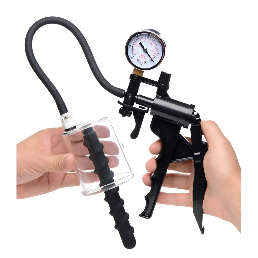Master Series Rosebud Driller Cylinder with black vacuum pump, pressure gauge, and silicone swirl insert, held by hands.