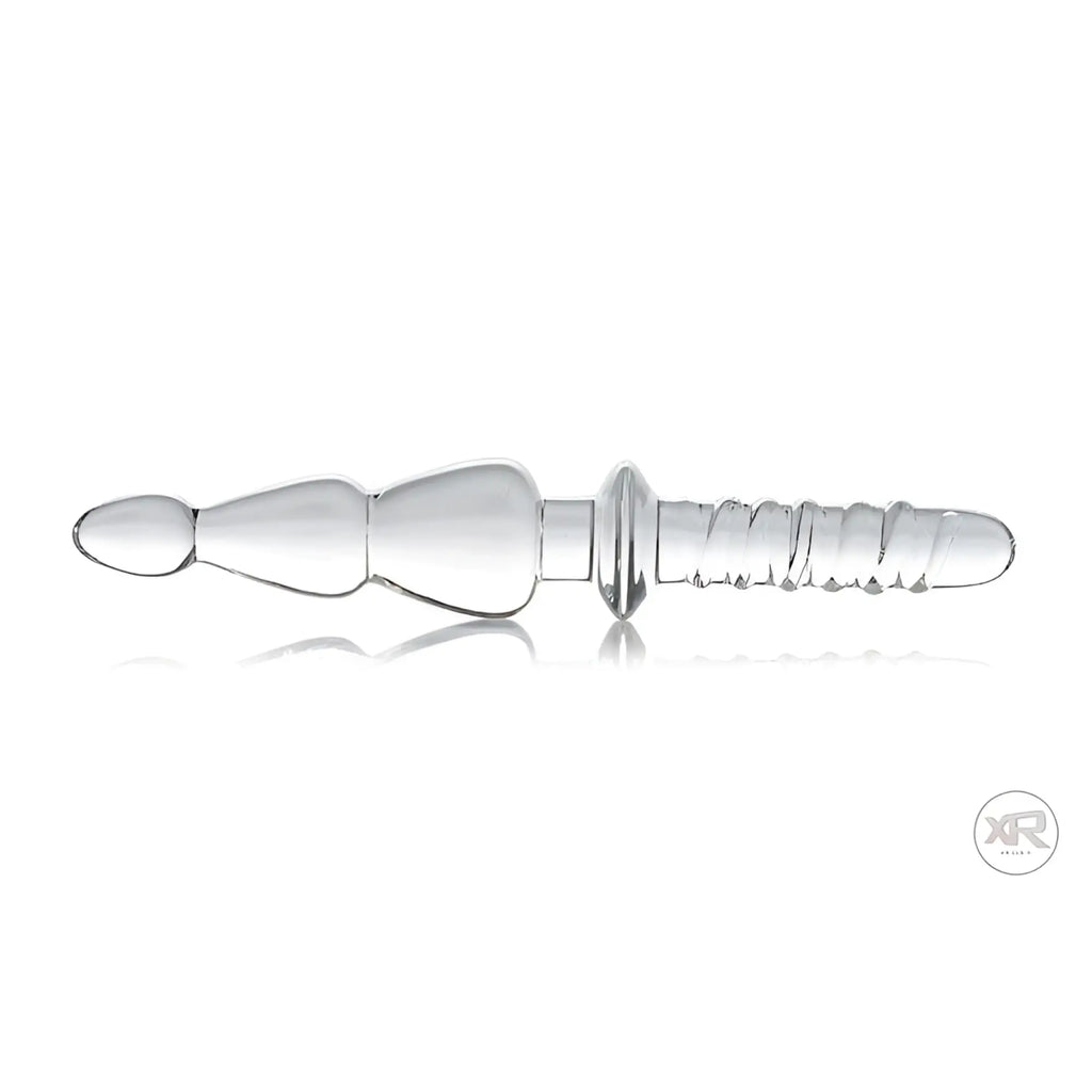 Master Series Saber glass thruster in clear, featuring a tapered, ridged probe design with a flared base.