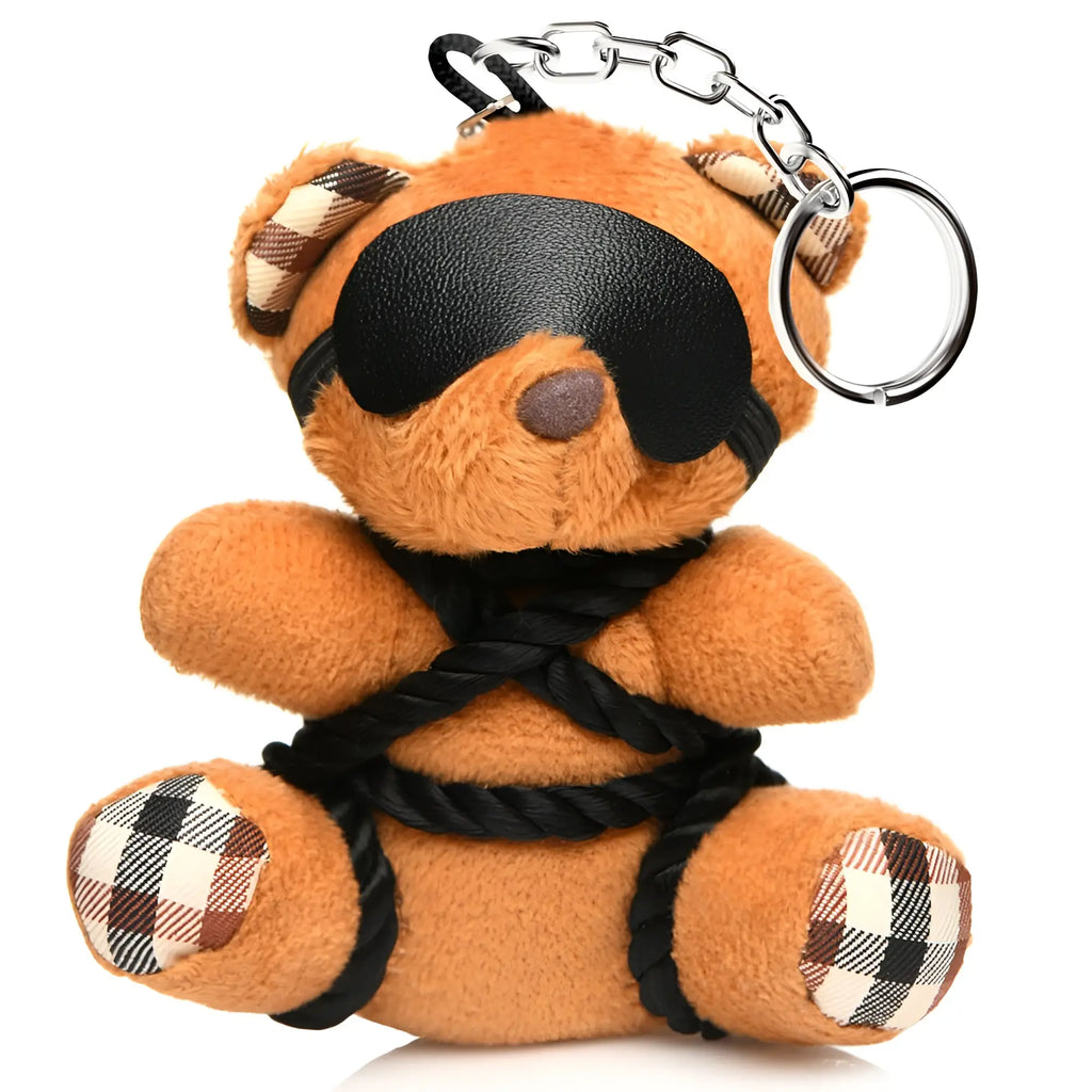 Master Series ShiBeari keychain: tan teddy bear with plaid accents, black eye mask, and decorative black rope binding.