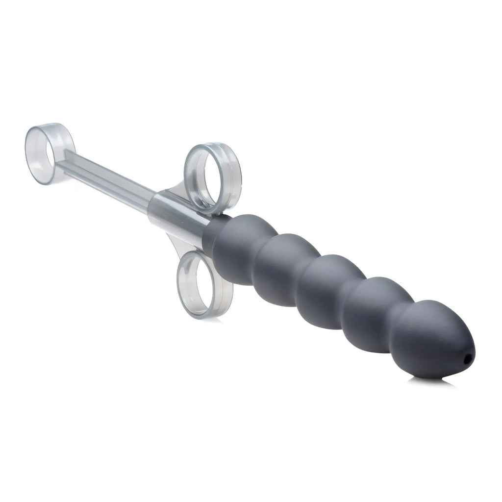 Master Series Silicone Links Lubricant Launcher: a dark grey, ribbed syringe-style device with clear finger rings.