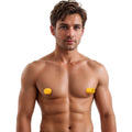 Master Series Snake Bite Suckers: A shirtless man wearing two bright yellow, cylindrical nipple suckers.