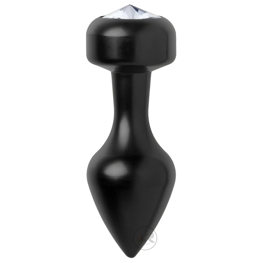 The Master Series Spade Petite Jewel Aluminum Anal Plug is a black, tapered anal plug with a rounded base and clear faceted gem, ideal for temperature play and adding style to your bedroom adventures.
