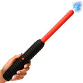 A hand holds a red and black Master Series Spark Rod zapping wand, which emits a bright blue electrical arc.