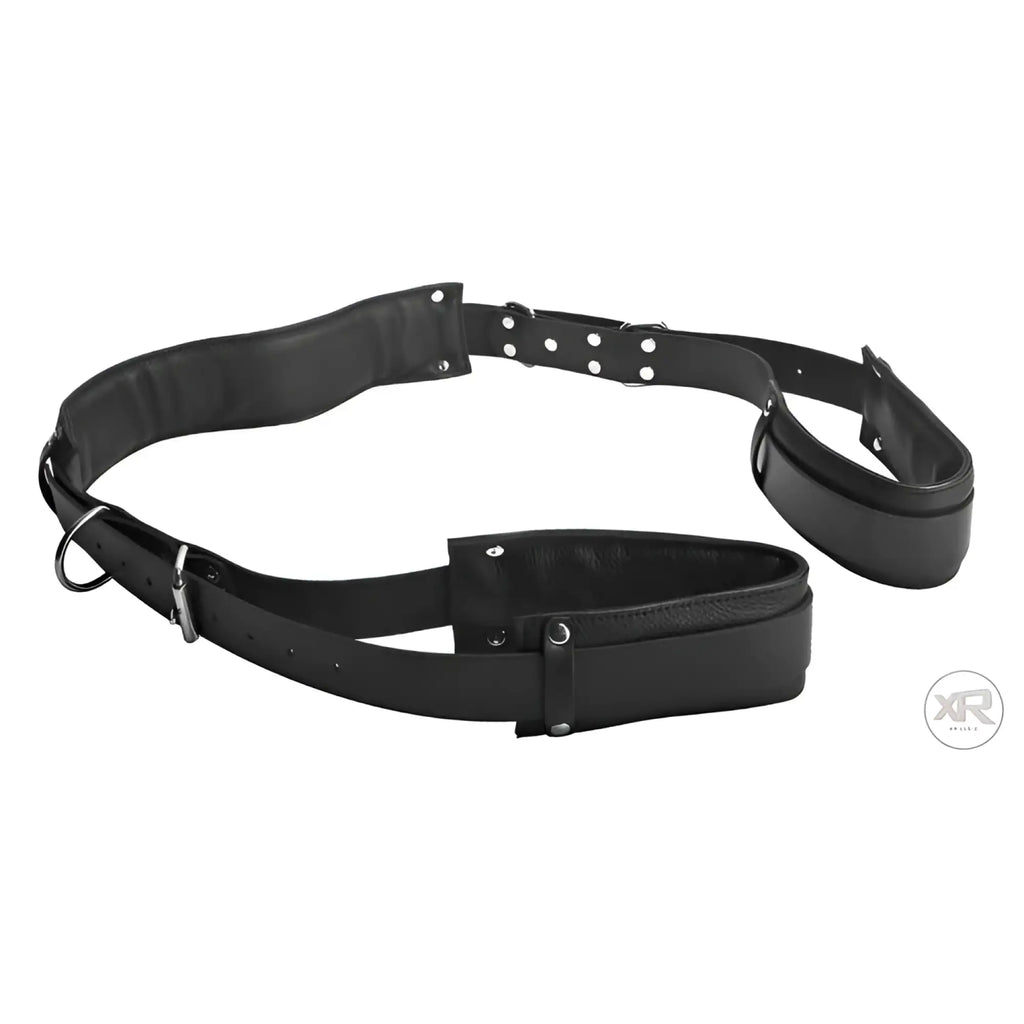 Black leather Master Series Spread Me Open thigh harness with adjustable straps and padded cuffs.