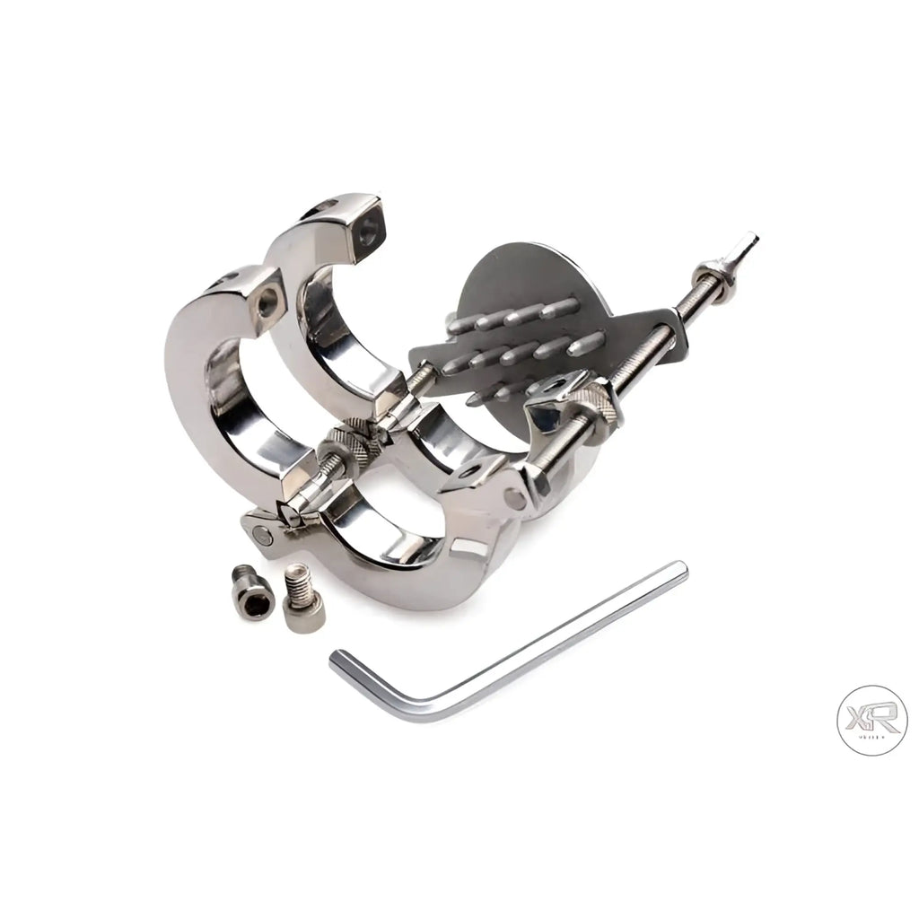 Master Series stainless steel spiked ball stretcher and crusher device with screws and an Allen key.