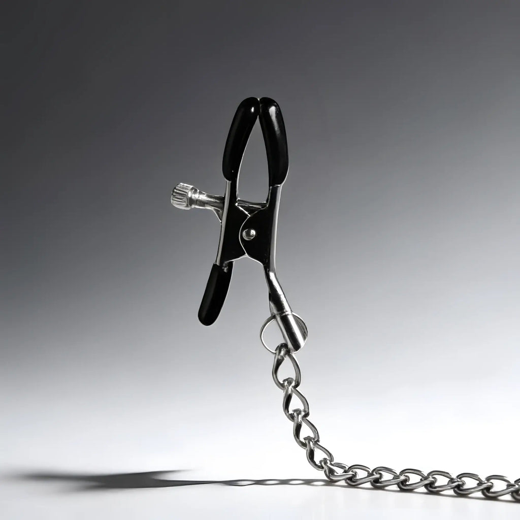 Master Series nipple clamp featuring a silver metal adjustable tension clip with black rubber tips and a linked chain.