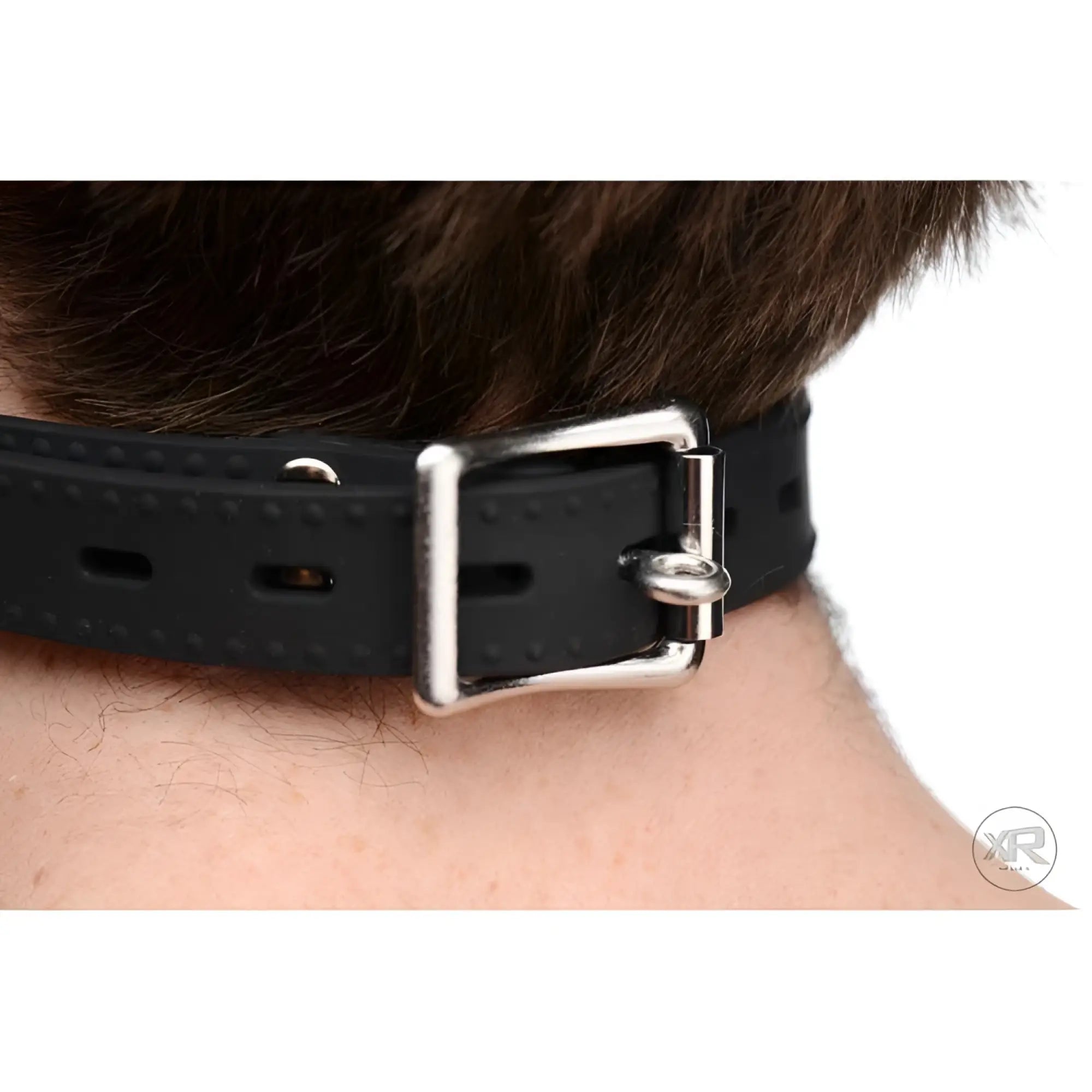 Master Series Suppressor Silicone Face Banger Gag featuring a black textured silicone strap with a metal buckle.