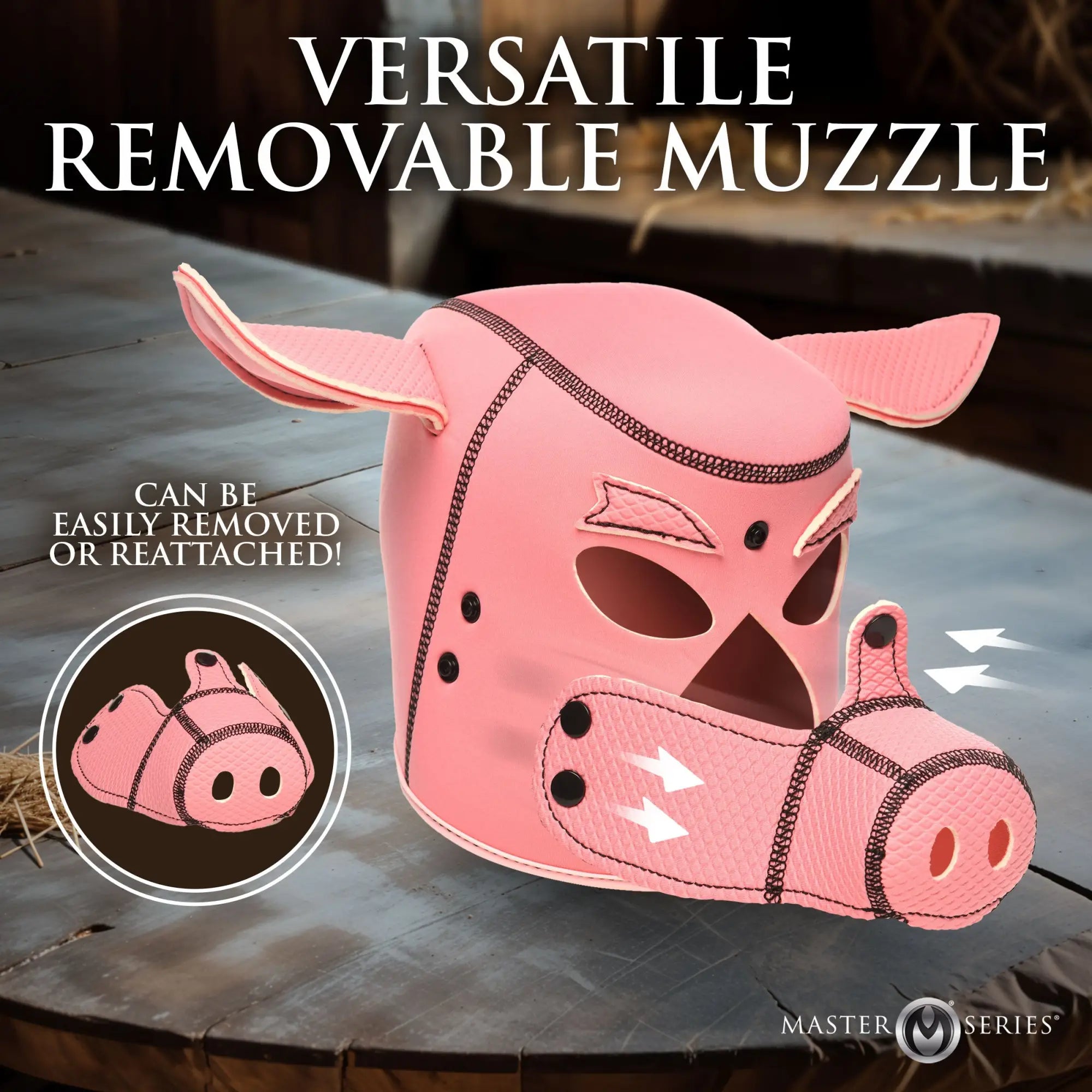 Pink Master Series Swine Pig neoprene hood with removable textured snout and ears, displayed on a wooden surface.