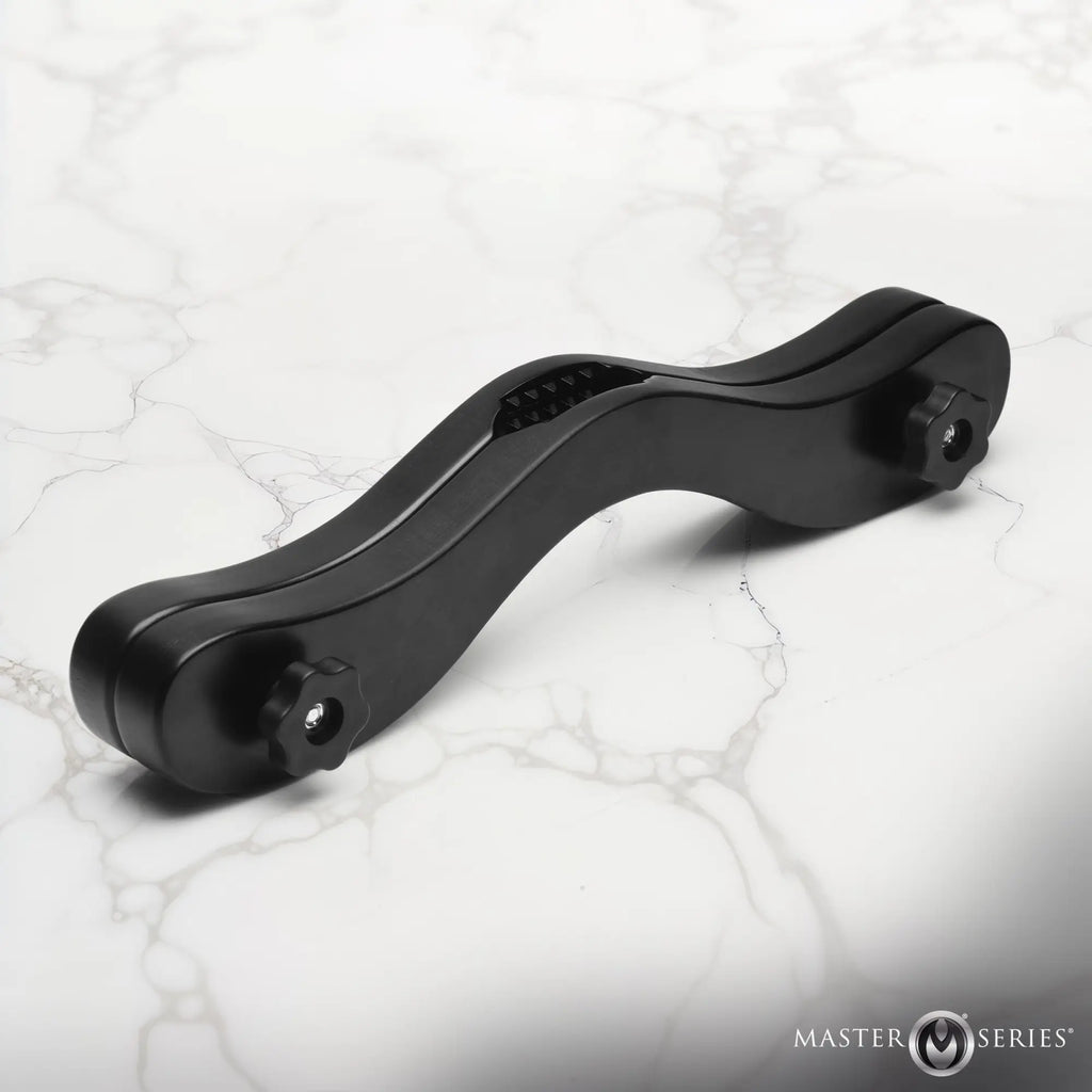 Master Series Thorns Spiked Wooden Humbler: A matte black, wavy-shaped wooden device with metal tension knobs.