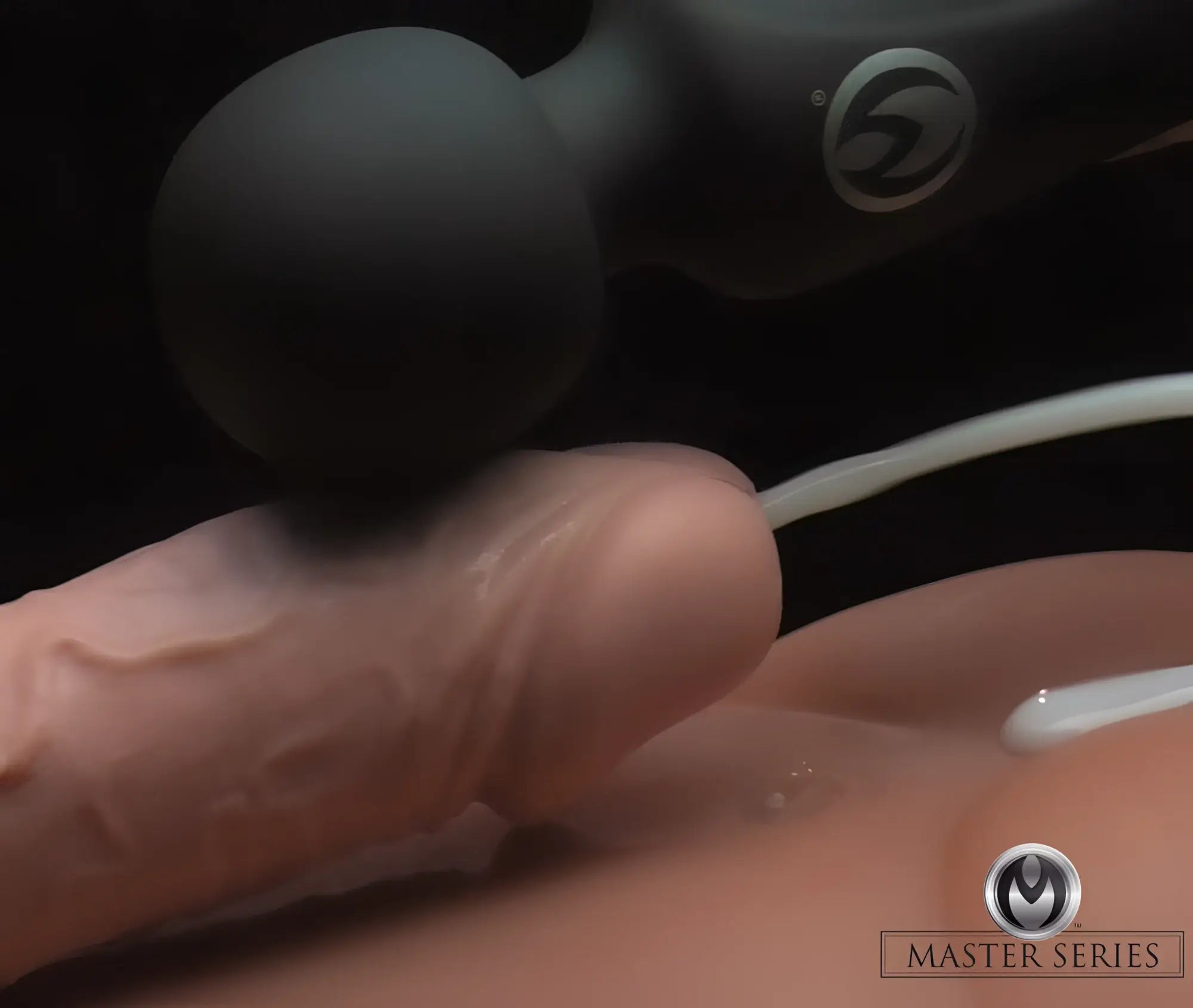 Master Series Thunderstick: A black silicone wand massager shown in use against skin with lubricant.