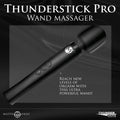 Master Series Thunderstick Pro: A sleek, black silicone wand massager featuring a circular head and control buttons.