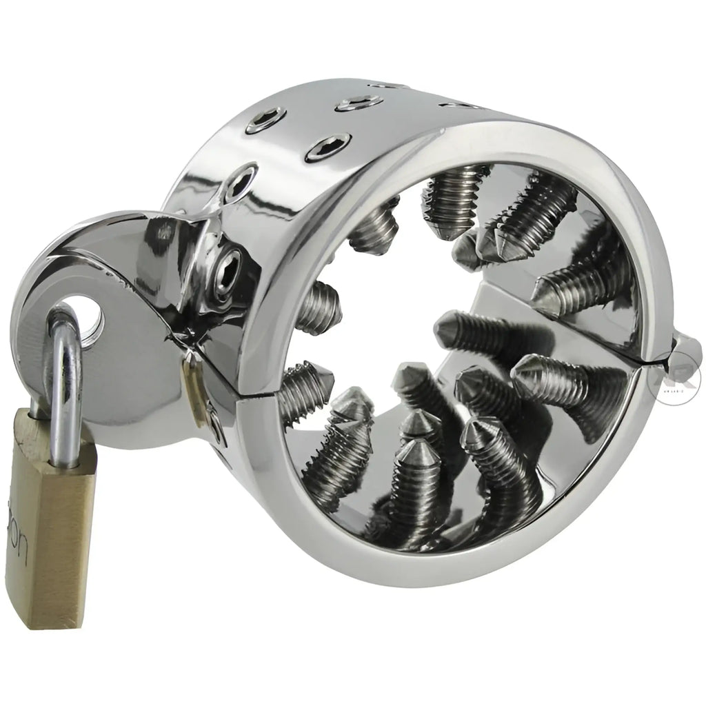 Master Series Toms Sharp Spikes CBT tool: a chrome-plated locking ring with internal, pointed spikes and a small padlock.