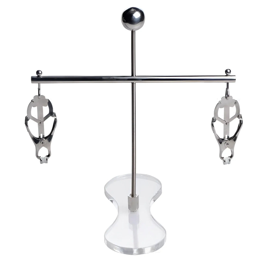 Master Series Tower of Pain: A chrome-finished metal stand holding two adjustable nipple clamps on a clear acrylic base.