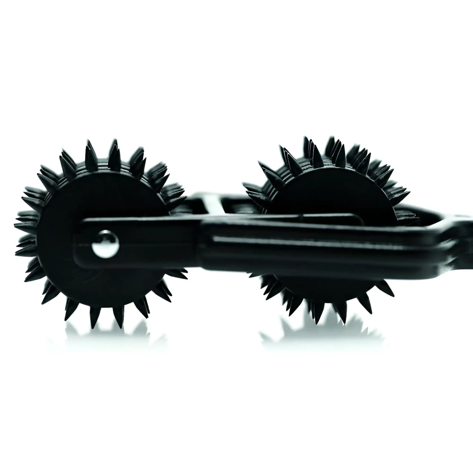 Master Series Transfix 10 Reel Dual Pinwheel: A black sensory tool with two spiked, rotating wheels on a metal frame.