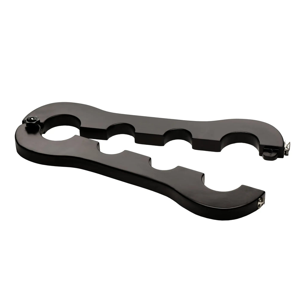 Master Series Trapped Wrist & Ankle Stocks: A sleek, black, hinged wooden restraint device with cutout openings.