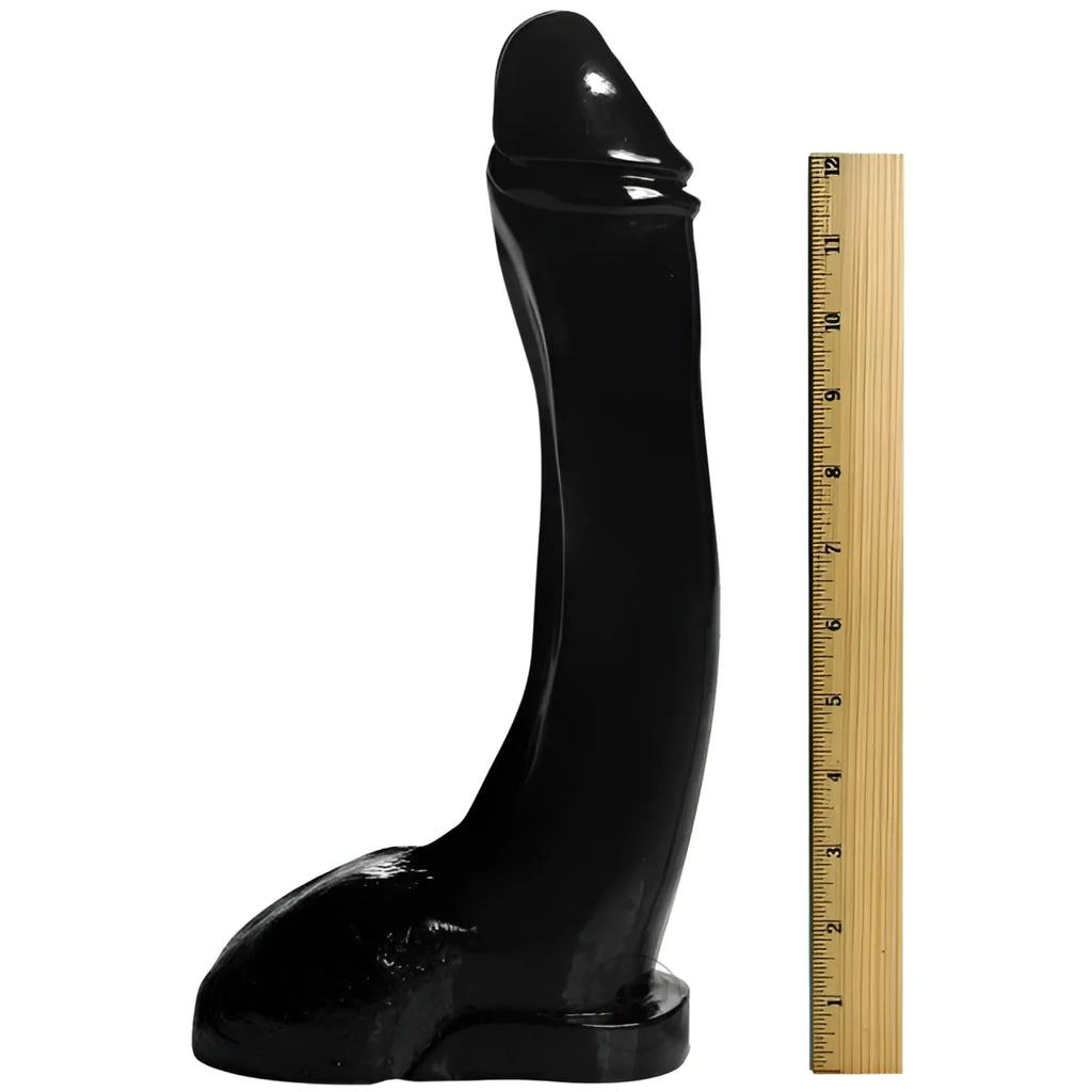 Master Series Tremendous Trevor dildo: a large, black, realistic penis-shaped dildo shown next to a 12-inch ruler.