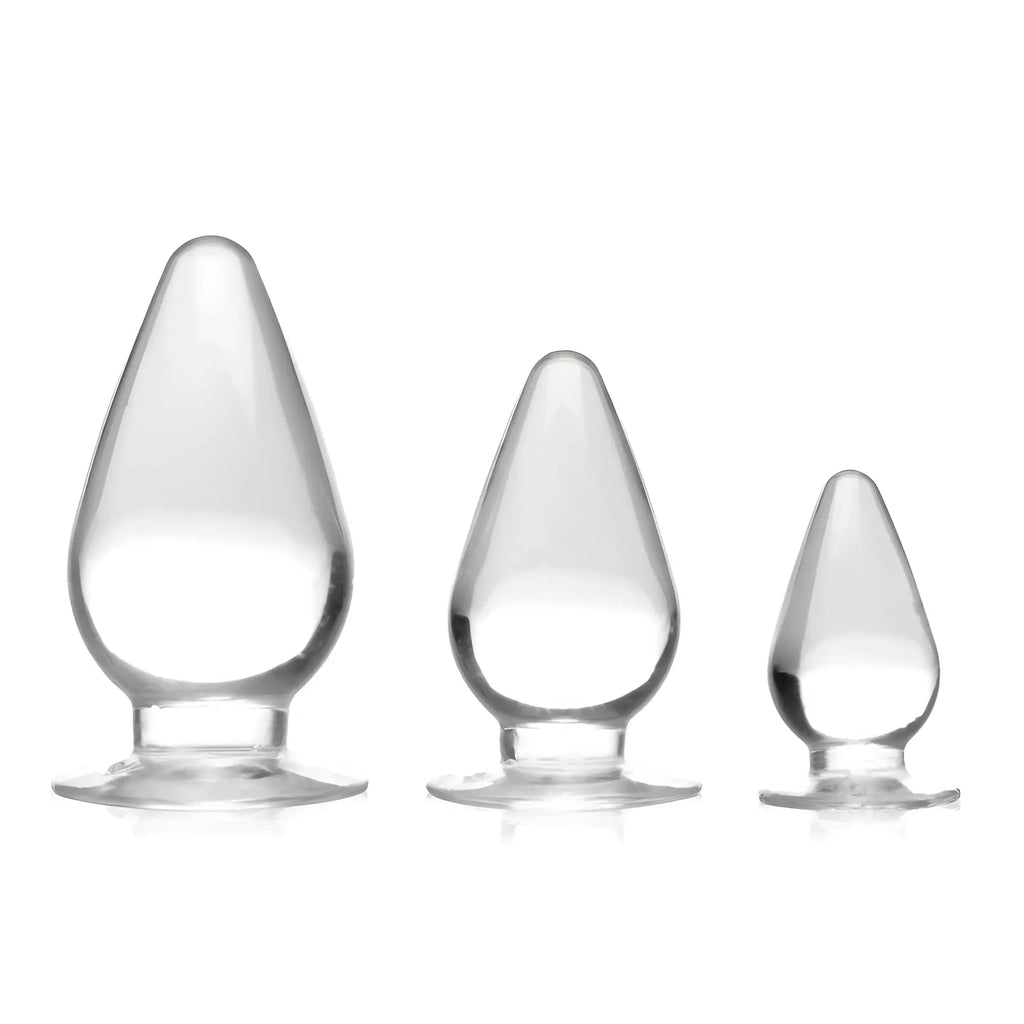 Master Series Triple Cones 3-piece set: clear, smooth, teardrop-shaped anal plugs of varying sizes with flared bases.