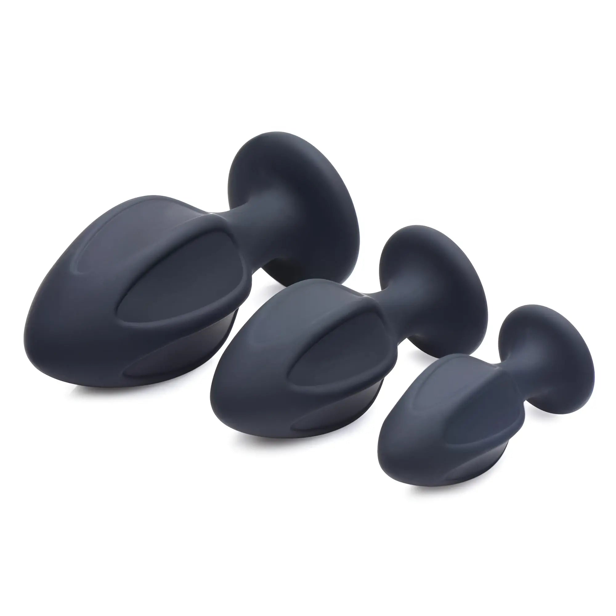 Master Series Triple Juicers: A set of three matte black, ribbed silicone anal trainers in graduated sizes.