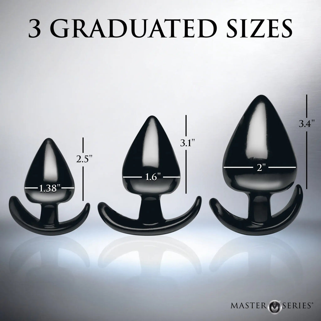 Master Series Triple Spades 3-piece anal plug set: three smooth, black, spade-shaped plugs in graduated sizes.