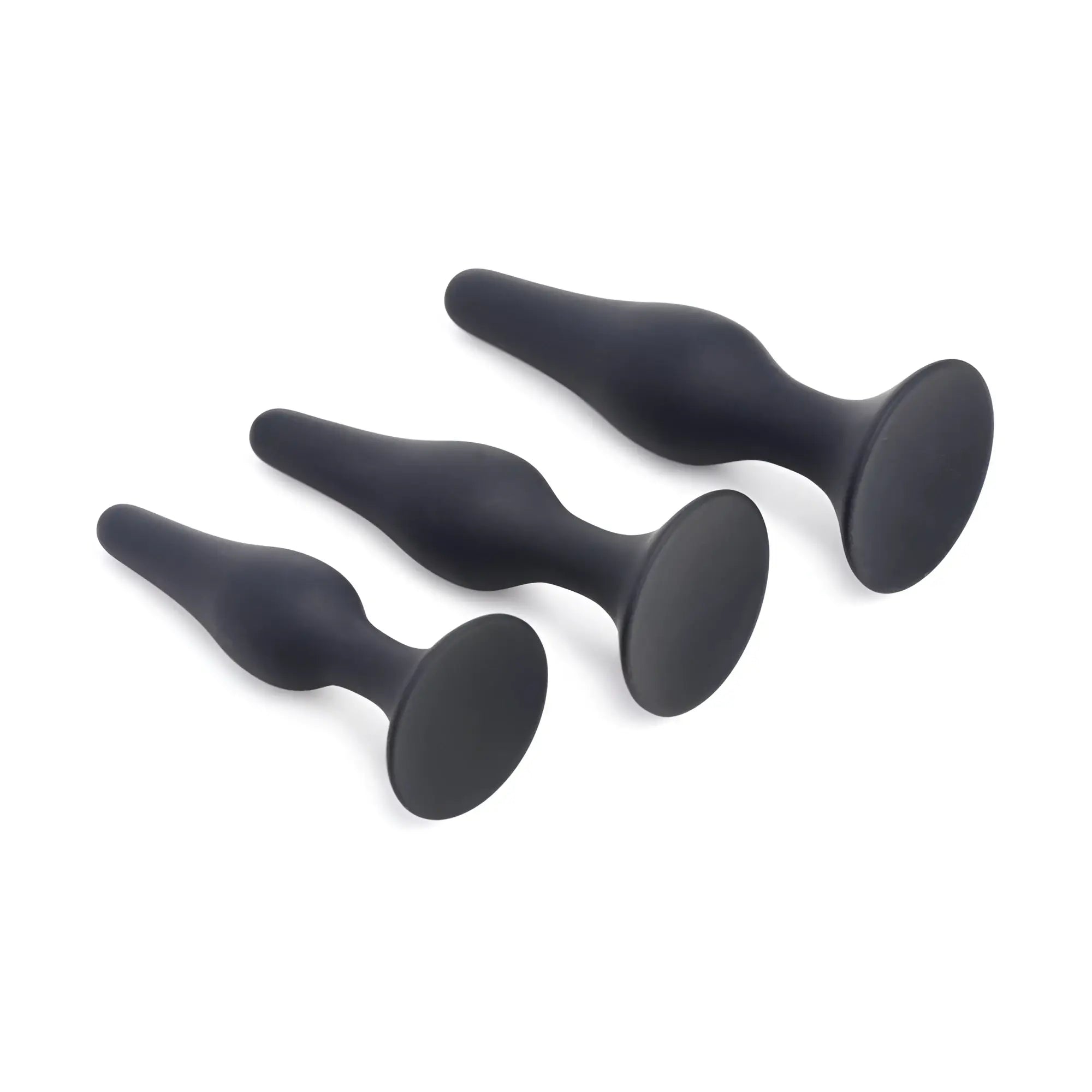 Master Series Triple Spire Tapered Silicone Anal Trainer Set: three matte black, bulbous silicone plugs in varying sizes.
