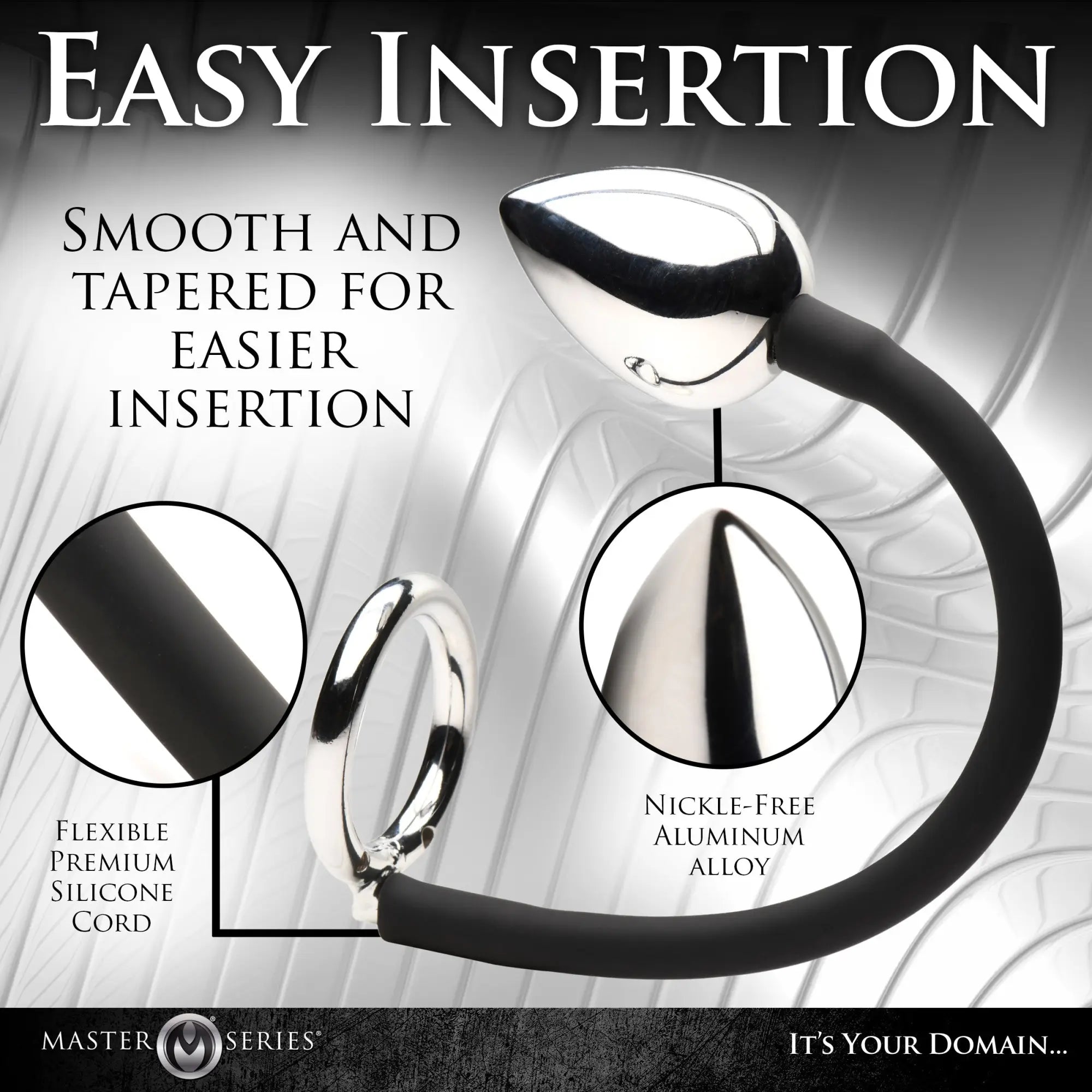 Master Series Tug and Plug: silver aluminum alloy anal plug and cock ring connected by a flexible black silicone cord.
