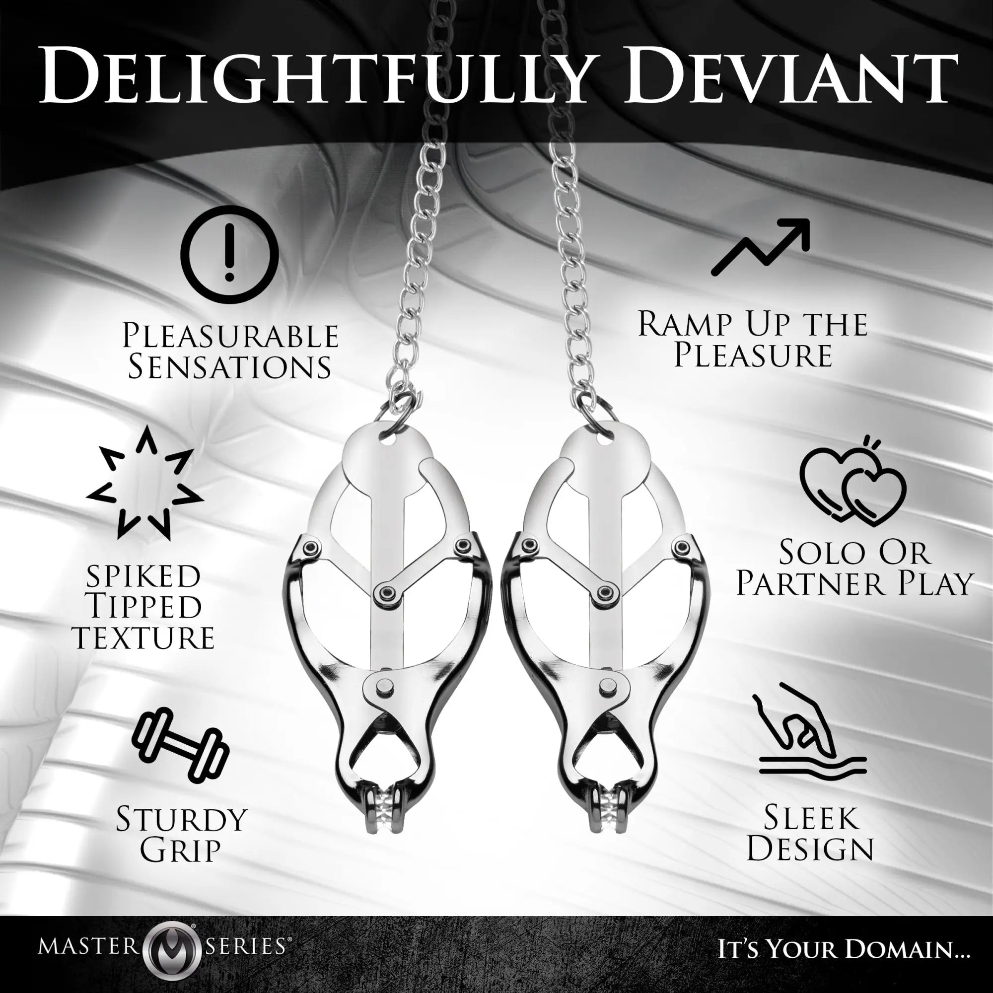 Master Series Tyrant Spiked Clover Nipple Clamps in polished silver with chains and infographic text overlays.