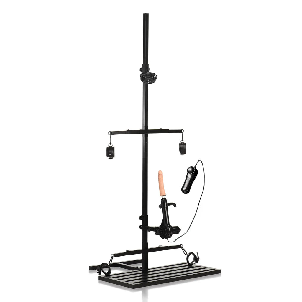 Master Series Ultimate Enforcer black metal bondage tower with sex machine, cuffs, and controller on a platform base.