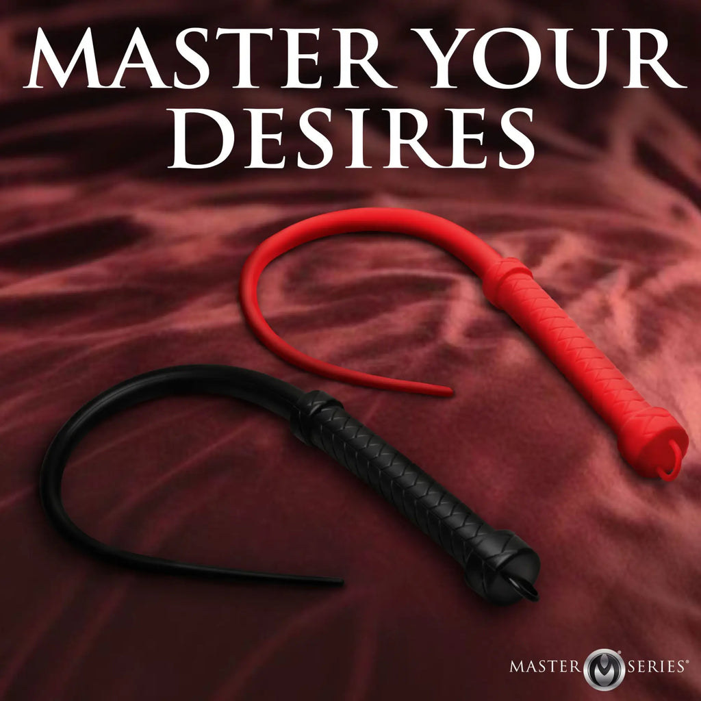 Master Series Viper Tail Silicone Whips in black and red, featuring textured handles on a dark red satin background.