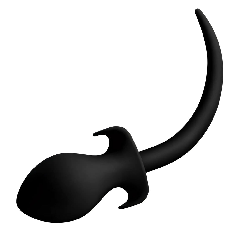 Master Series Woof XL: A matte black silicone puppy tail butt plug with a flared base and a curved, pointed tail.