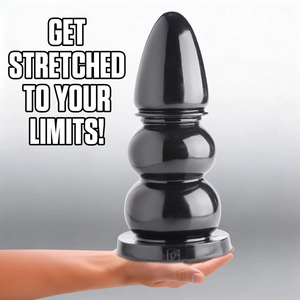 Master Series Wrecking Balls XXL: A large, glossy black, multi-sphere dildo being held in a hand.