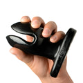 A hand holds a large, glossy black Master Series XL Ass Anchor flared anal plug with a unique, split-tip design.