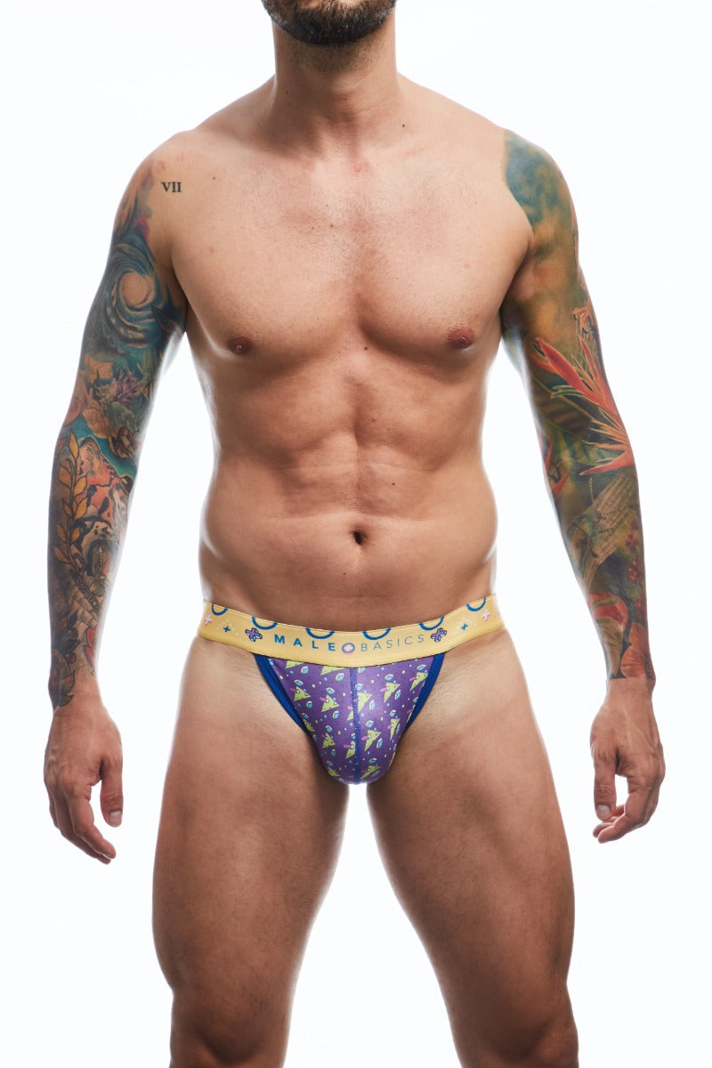 Man wearing colorful men's MaleBasics jockstrap underwear on a white background