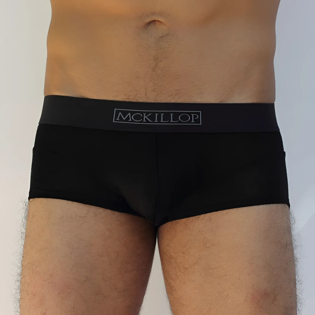 Black McKillop Jagger modal boxer briefs in black with a sleek fitted design and subtle gray logo on the waistband