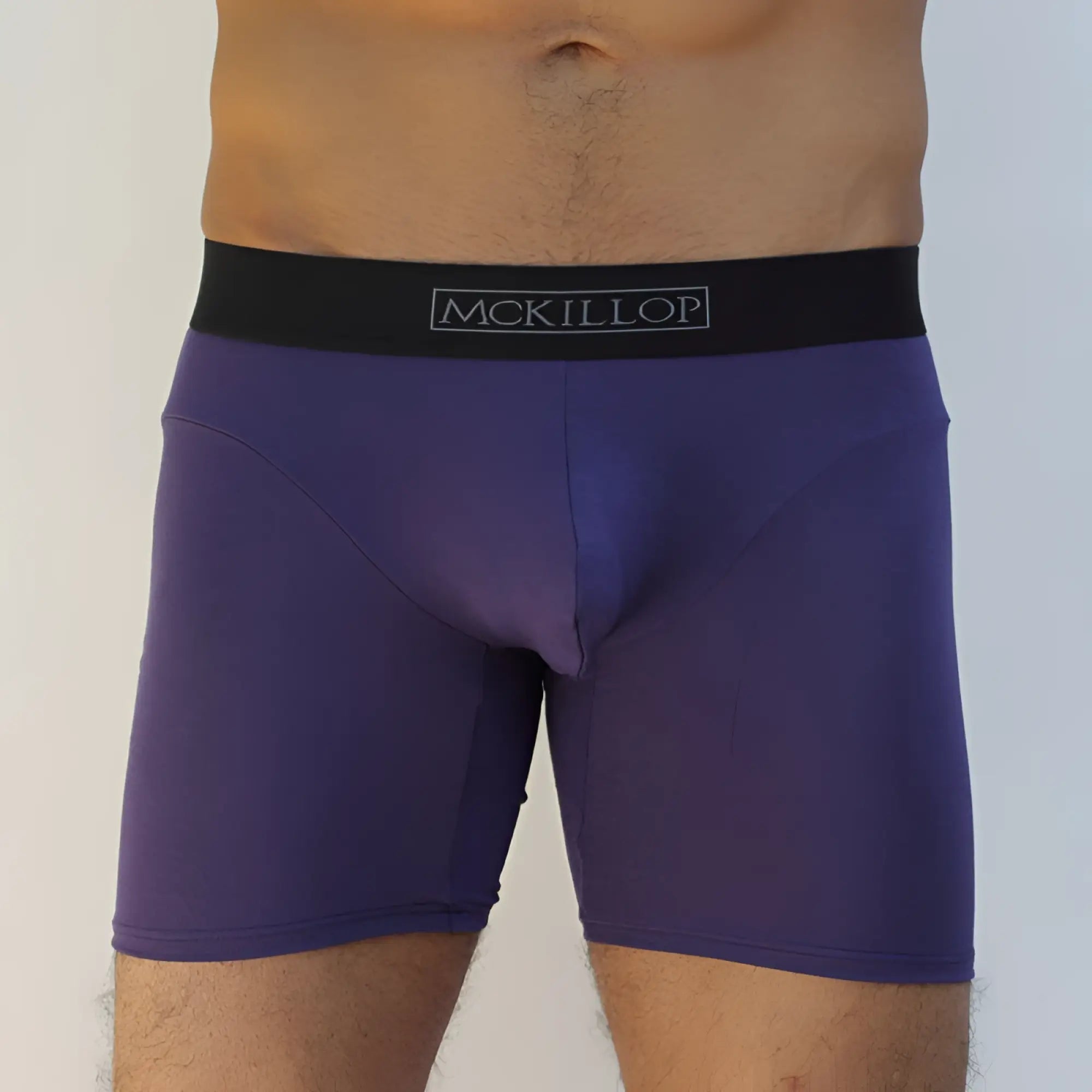 Purple mckillop brand modal long boxer briefs in eggplant with a black waistband size medium front view
