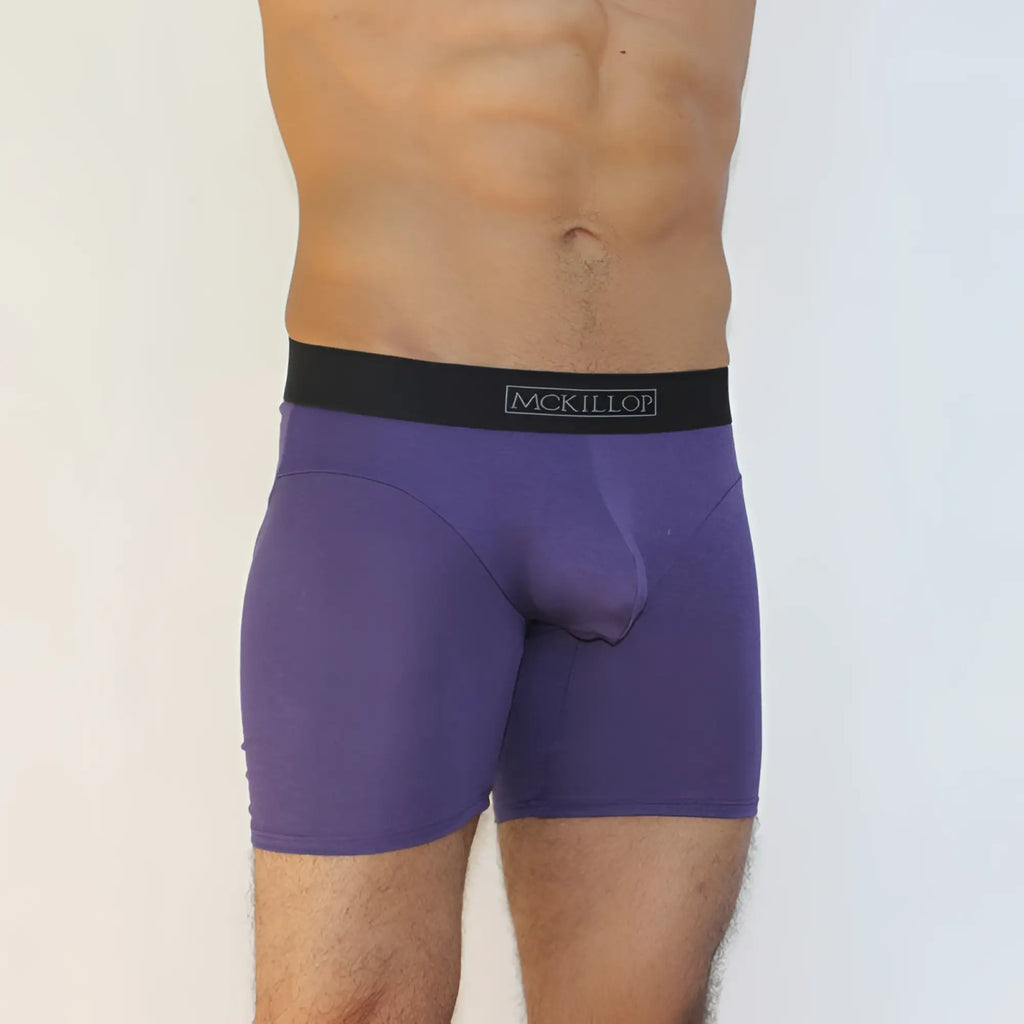 Purple mckillop modal long boxer briefs with a black waistband in eggplant color size m showing front side