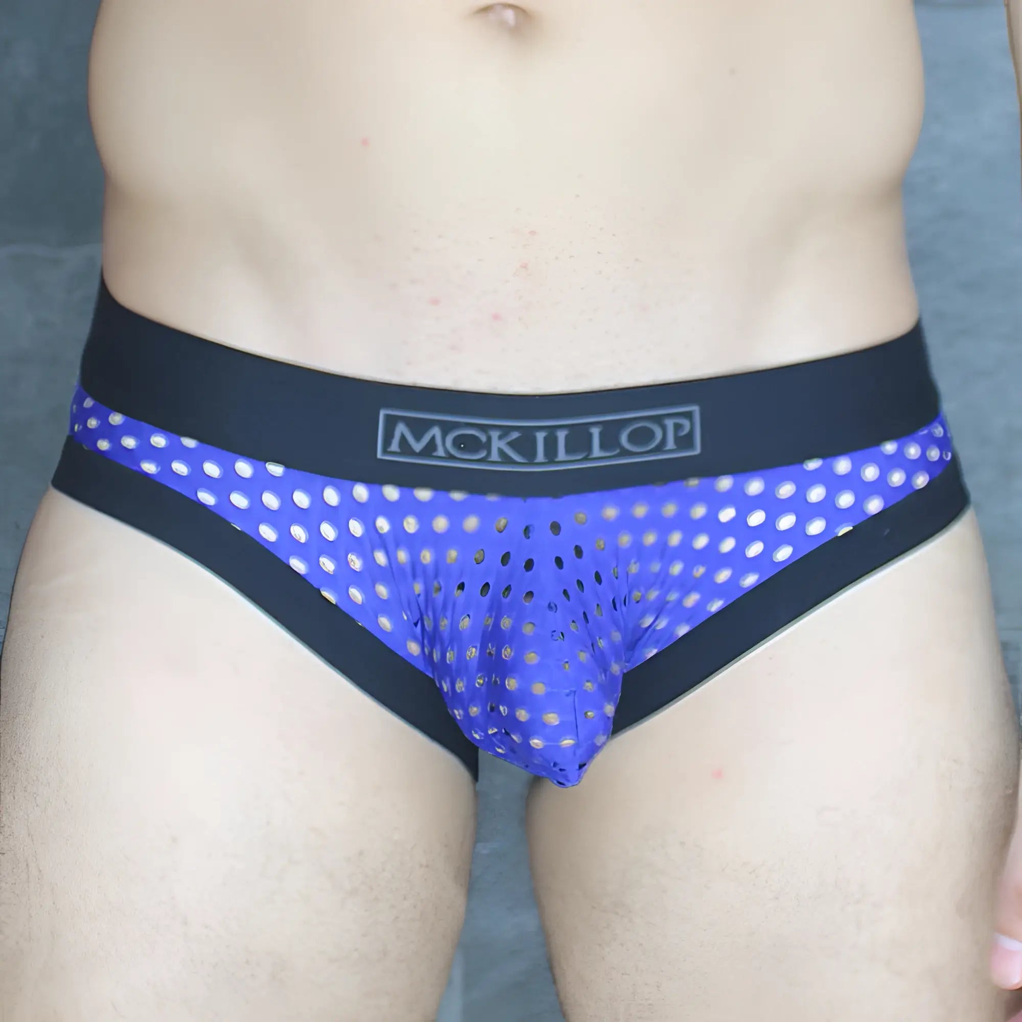 Blue polka-dot mckillop mckobhq briefs with black trim and mesh fabric for comfortable everyday wear