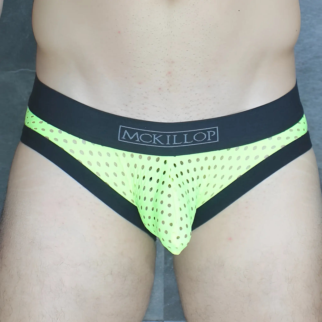Neon green mesh briefs with black trim and mckillop logo on waistband from mckillop mckobhq brief collection