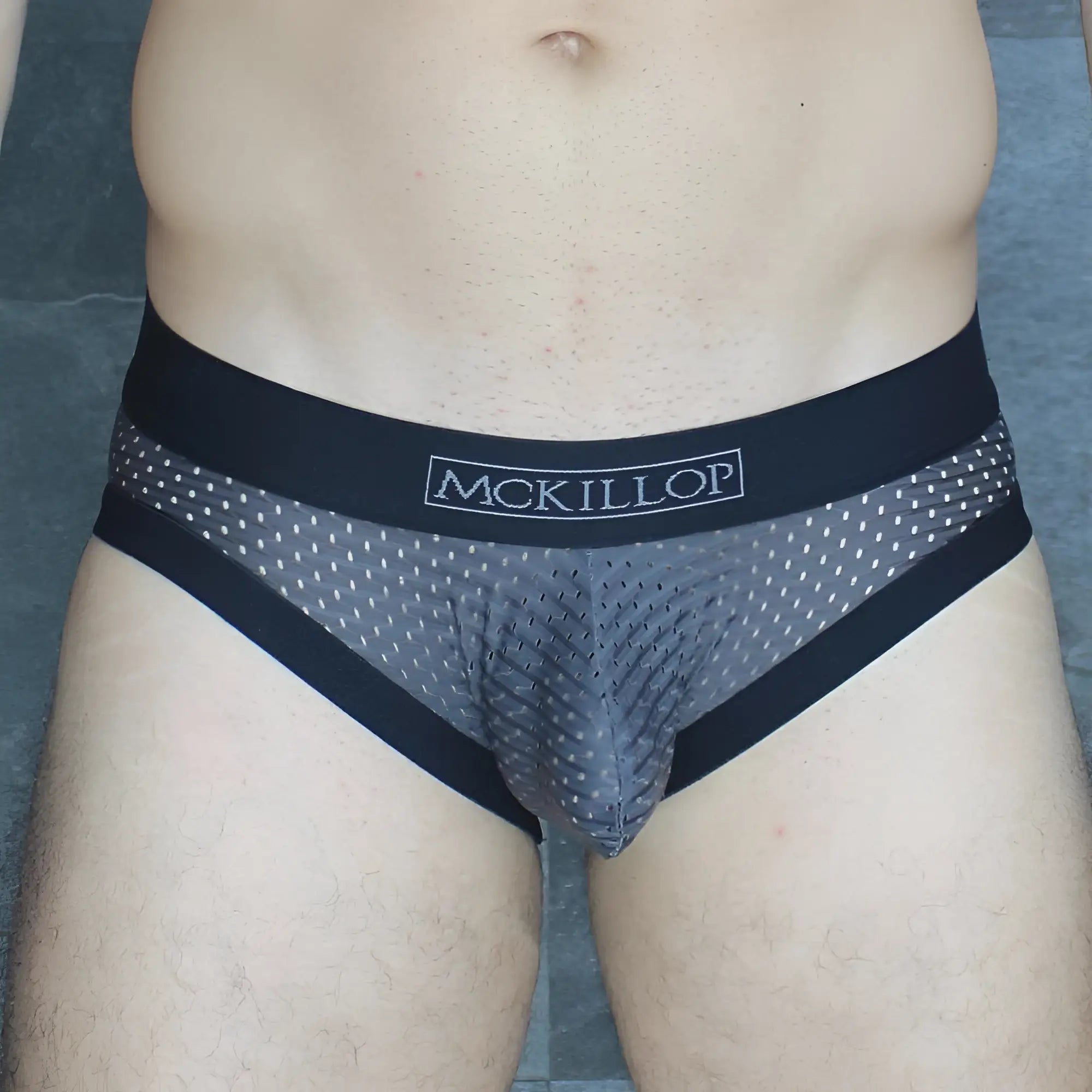 Gray and black mckillop mckobpl briefs with a breathable mesh pattern for comfortable everyday wear