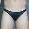 Black mesh mckillop mckvkpl bikini brief with perforated design showcasing breathable fabric and stylish look