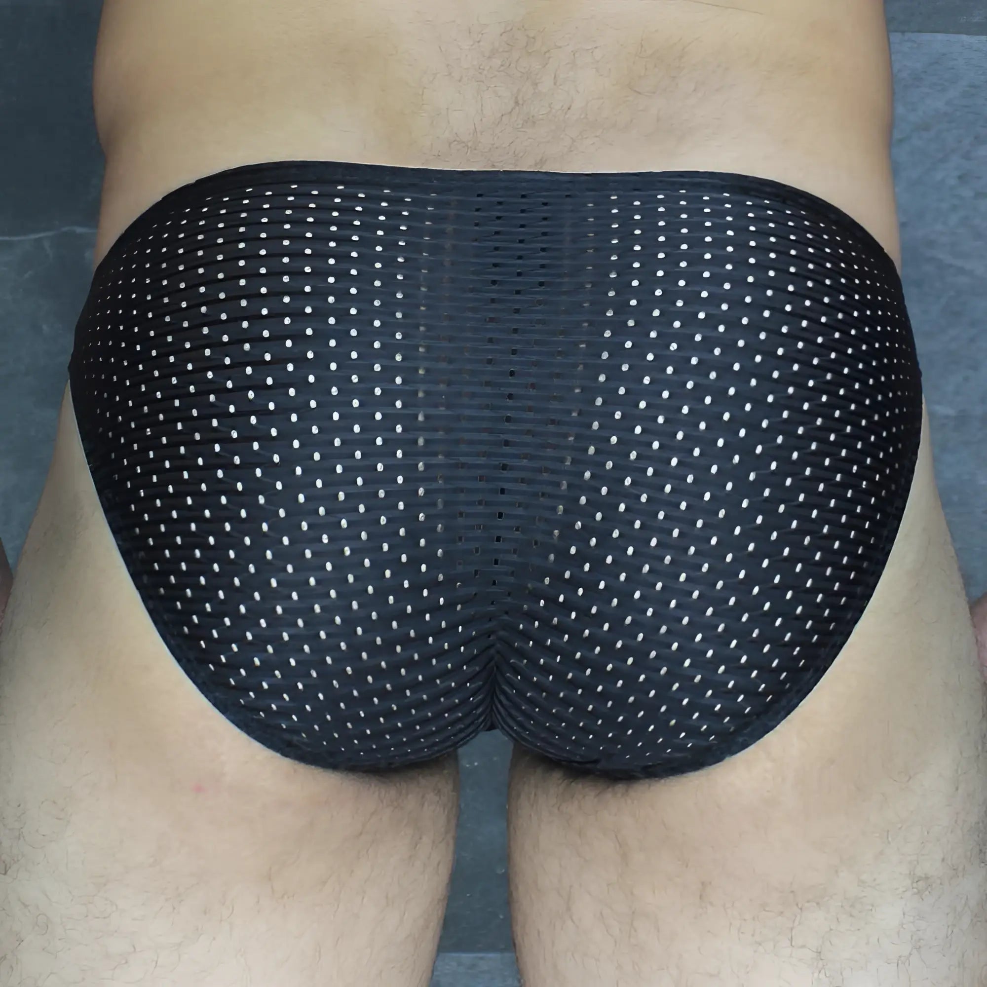 Mckillop MCKVKPL bikini brief in black mesh with a subtle white dot pattern showcasing the front side