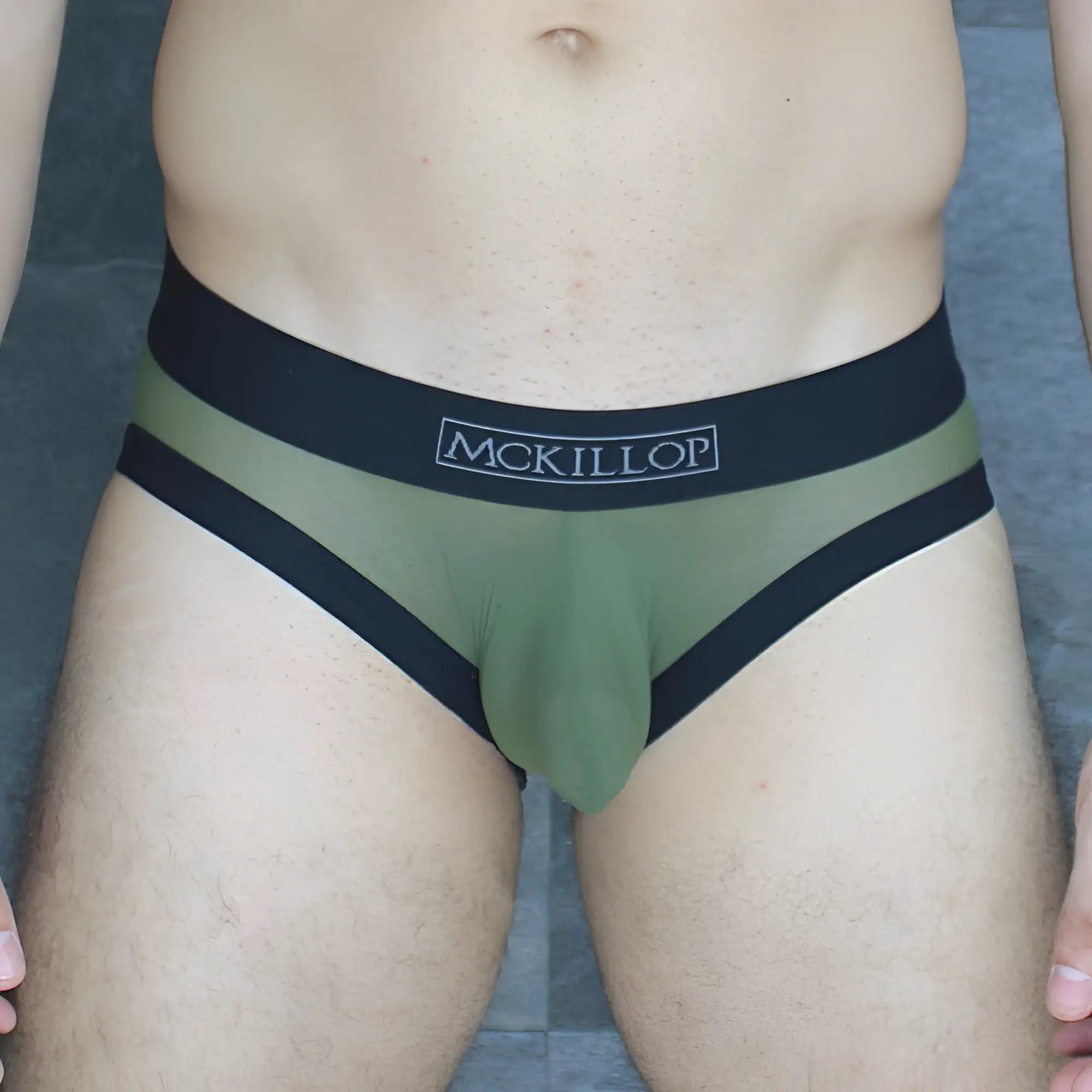 Olive green mckillop obus hoist brief ultra mesh with black trim and contrasting waistband in breathable fabric