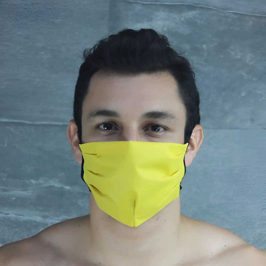 Bright yellow McKillop polypropylene unisex face mask with black trim in one size for general use