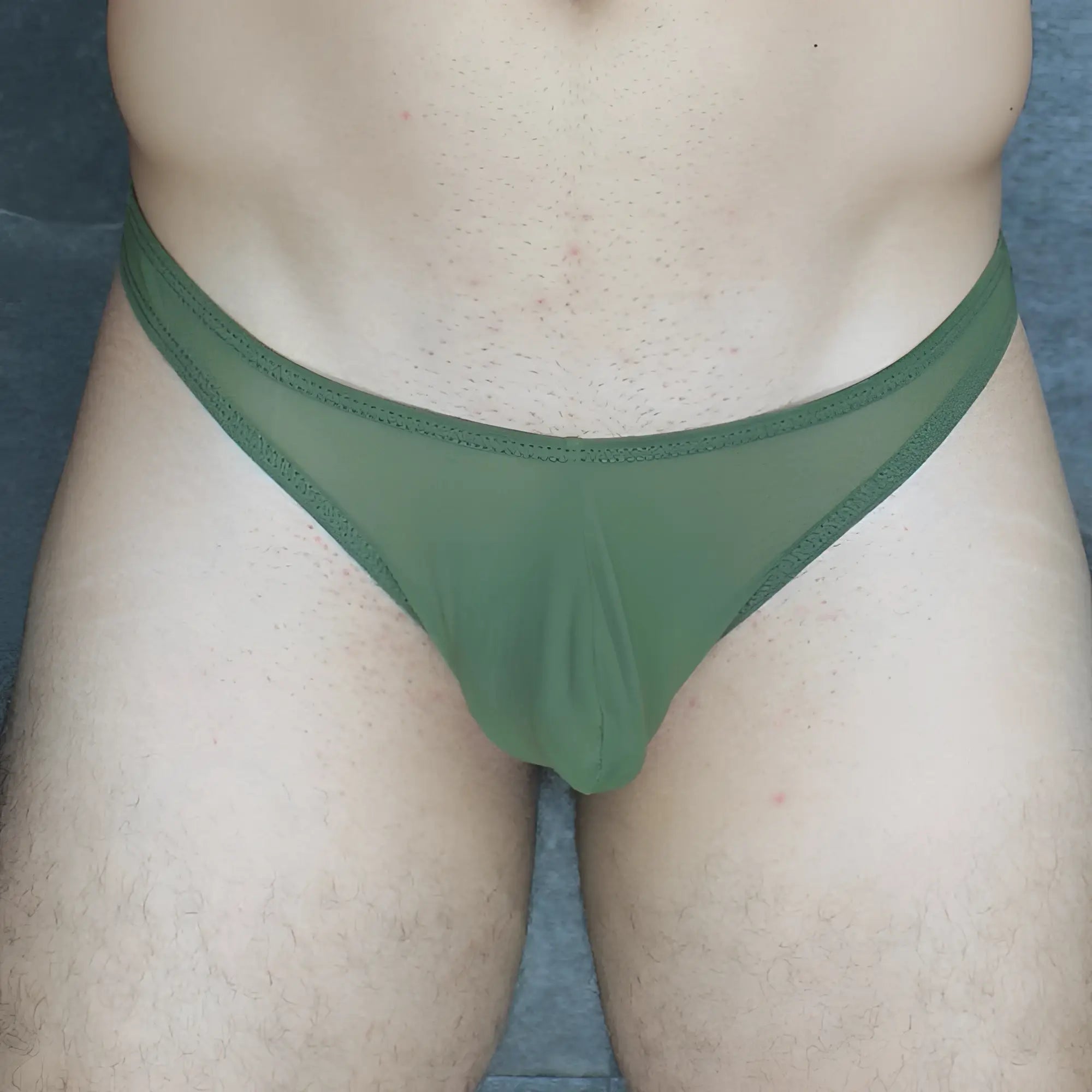 Olive green sheer mesh thong mckillop vtus hoist thong ultra mesh showing front side design and material details