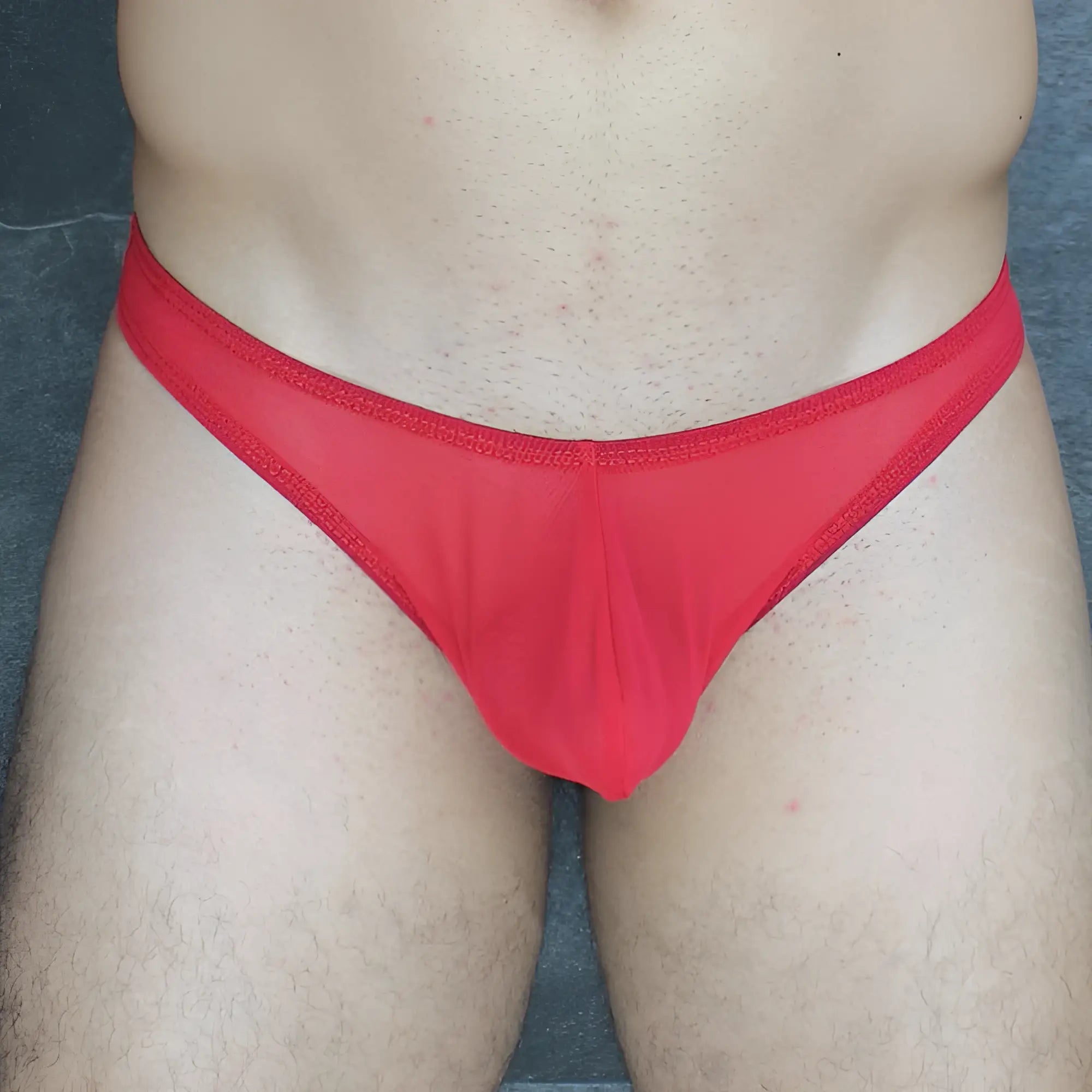 Red sheer mesh thong with solid red waistband from mckillop vtus hoist thong ultra mesh collection