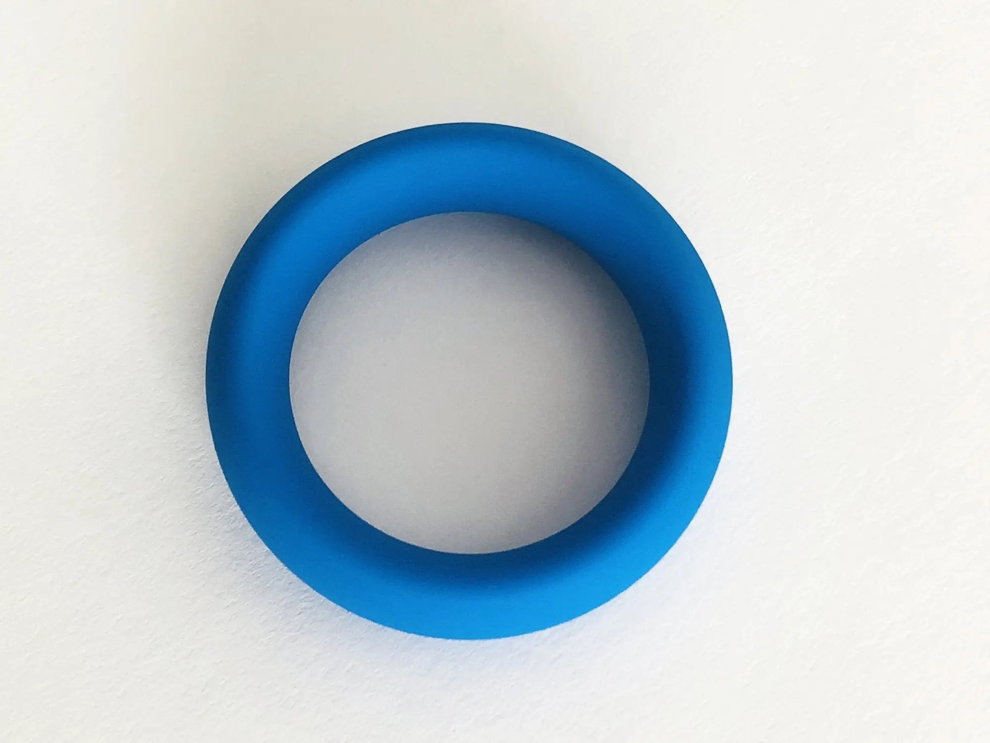 A solid blue silicone ring with a smooth matte finish from the meat rack collection