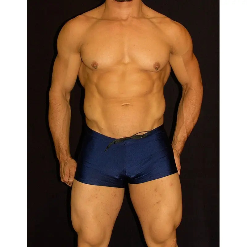 Navy square cut boxer swimwear by Arroyman featuring a drawstring waist and a fitted design shown on a model.