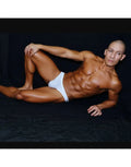 White mesh bikini underwear by Arroyman featuring a snug fit and minimal coverage modeled on a male figure.