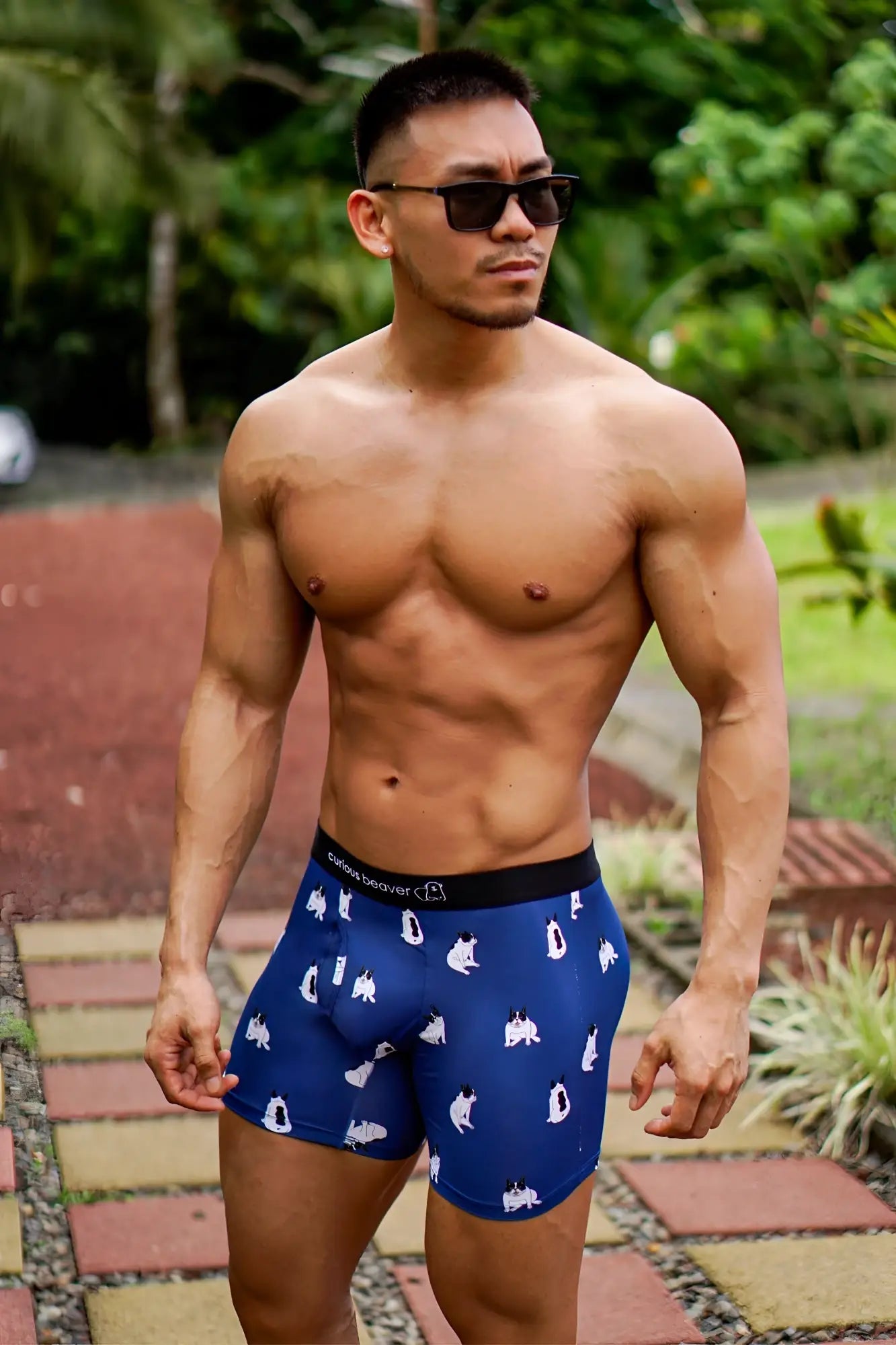 Men’s blue boxer briefs with white penguin pattern and black elastic waistband in Bulldogs design